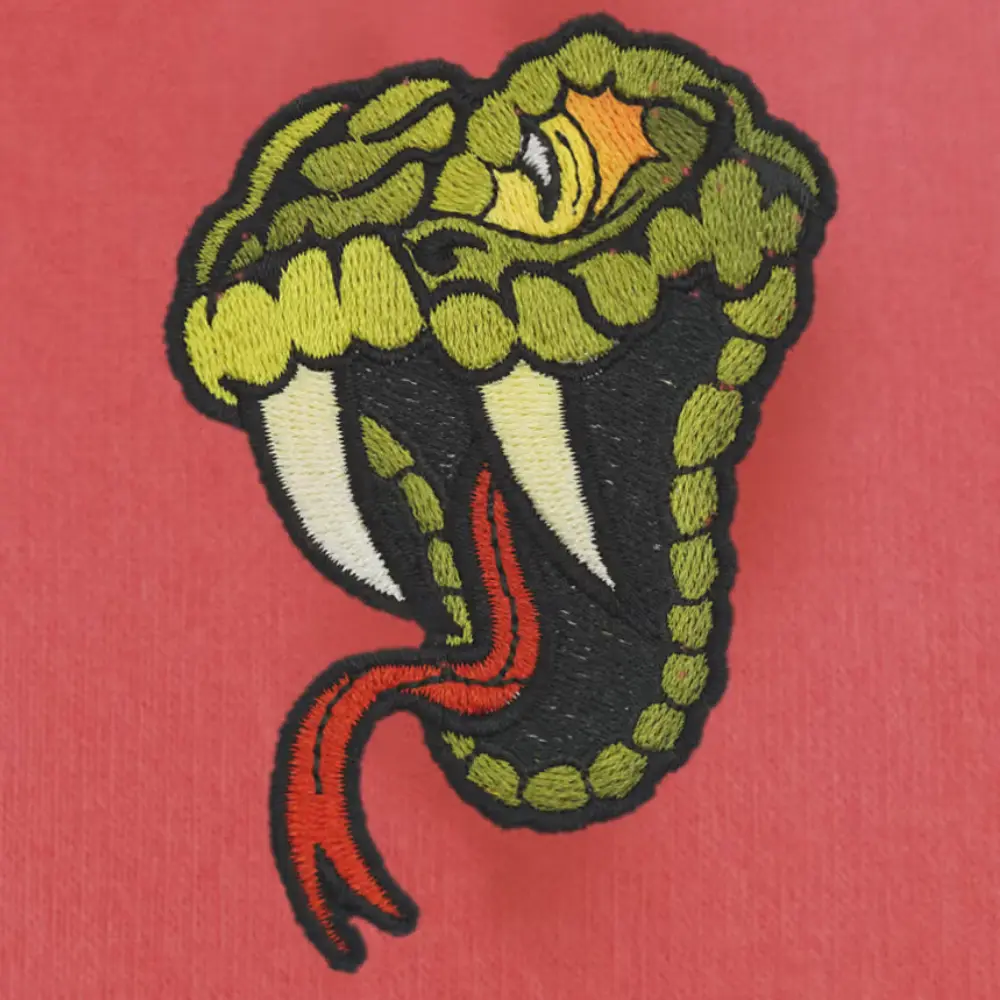 Green pit viper snake head embroidered patch digitizing